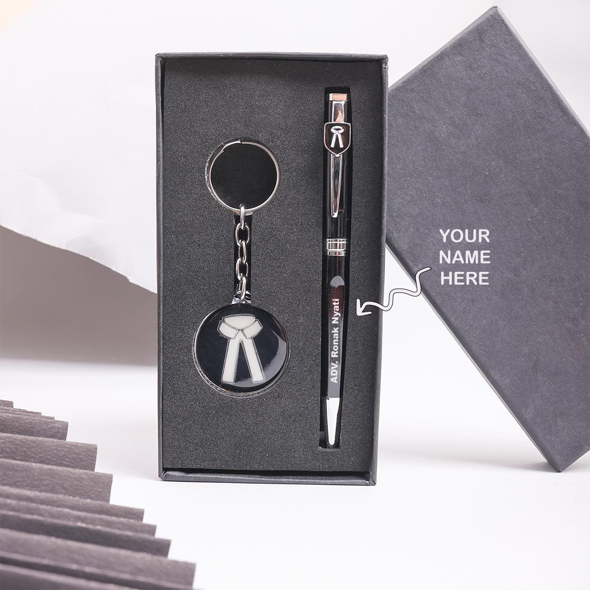 Custom pen and keychain for advocates presented in a stylish gift set box