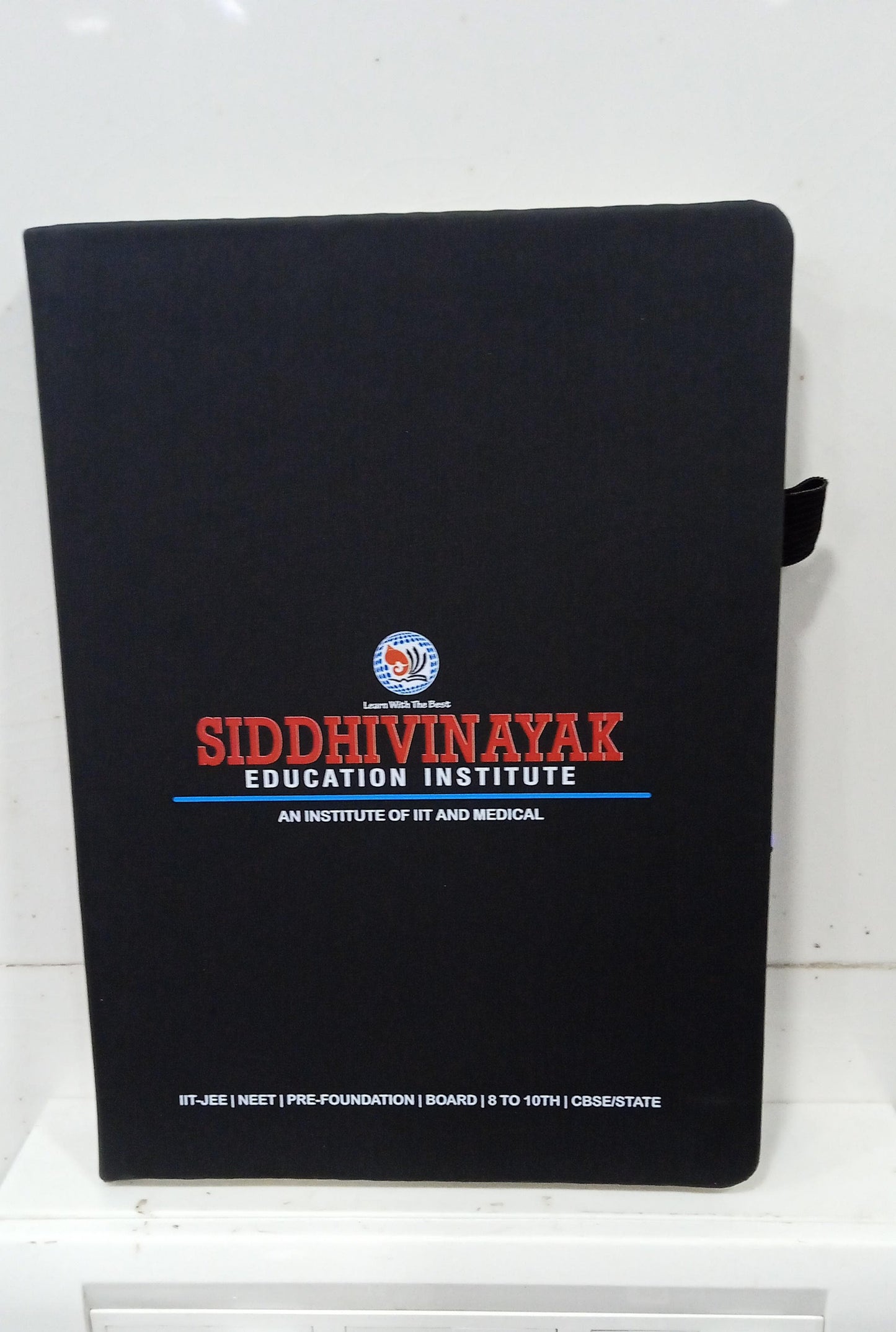 Personalized A5 notebook featuring the Siddhivinayak Education Institute logo, ideal for customized A5 corporate gifts