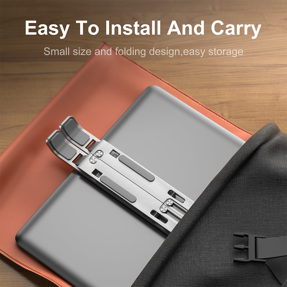 Engraved silver aluminum laptop stand with a foldable design for easy storage and portability