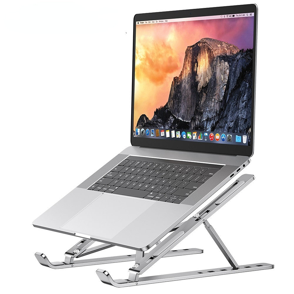 Engraved silver aluminum laptop stand adjustable for ergonomic comfort and improved airflow