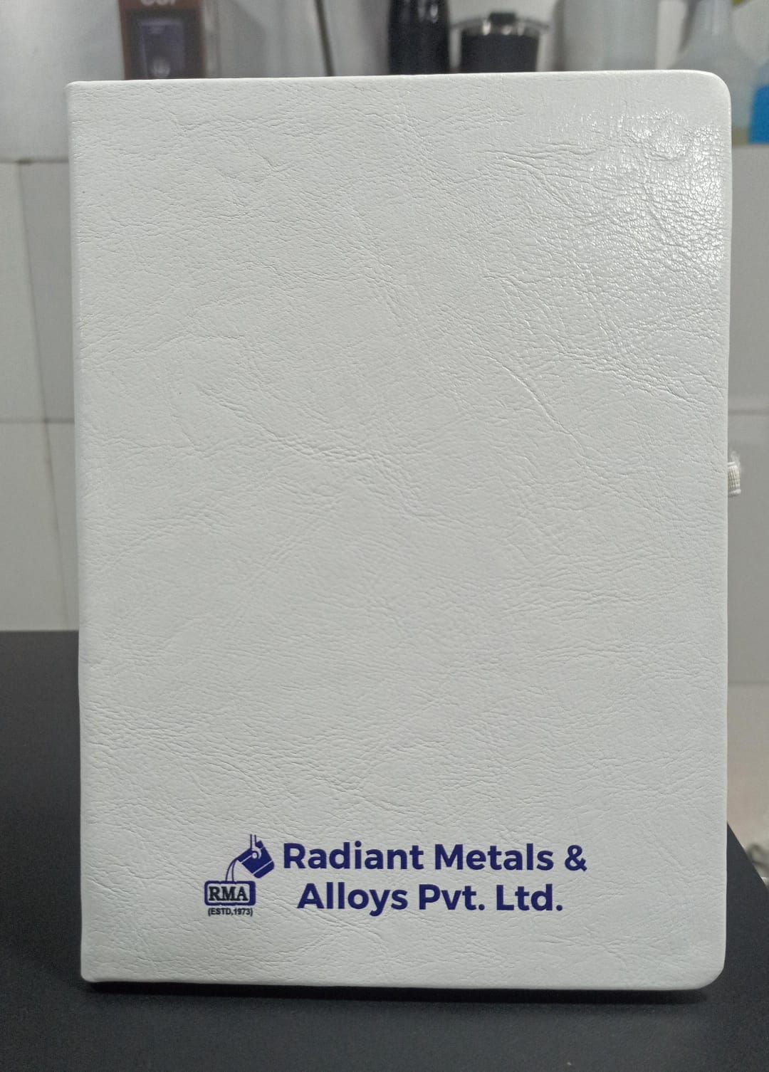 Personalized white logo printed A5 notebook featuring a company logo on the cover