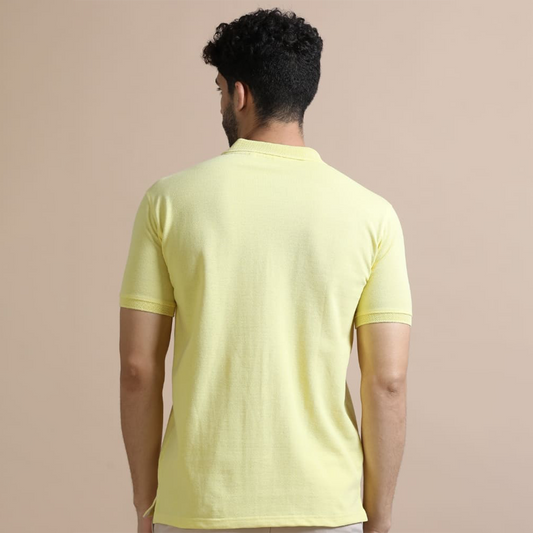 Back view of the personalized yellow jacquard polo t-shirt showing clean structure and textured fabric finish.
