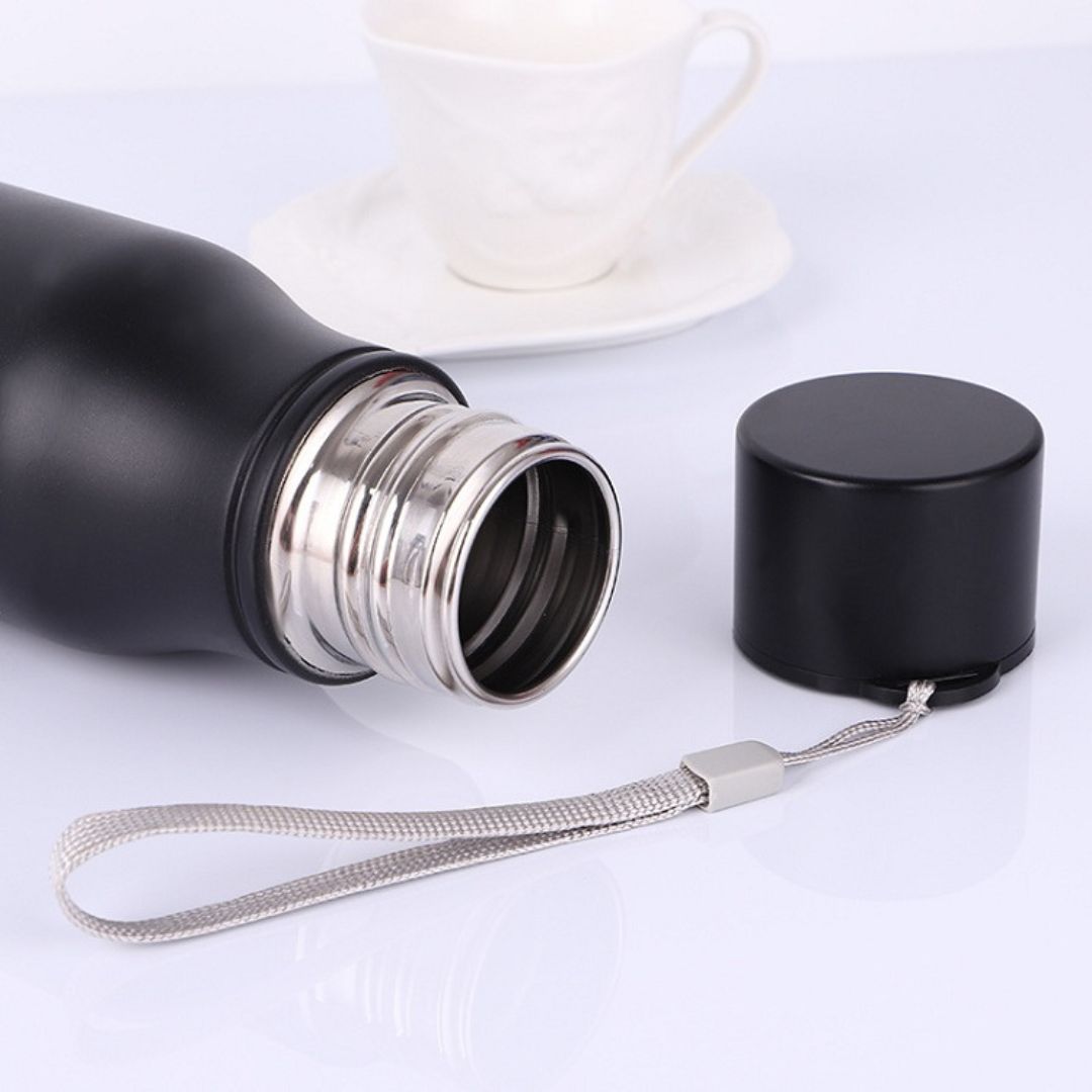 Personalized black stainless steel water bottle with a cap and durable design for everyday use