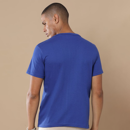 Back view of the personalized blue round neck t-shirt showing clean structure and textured fabric finish.