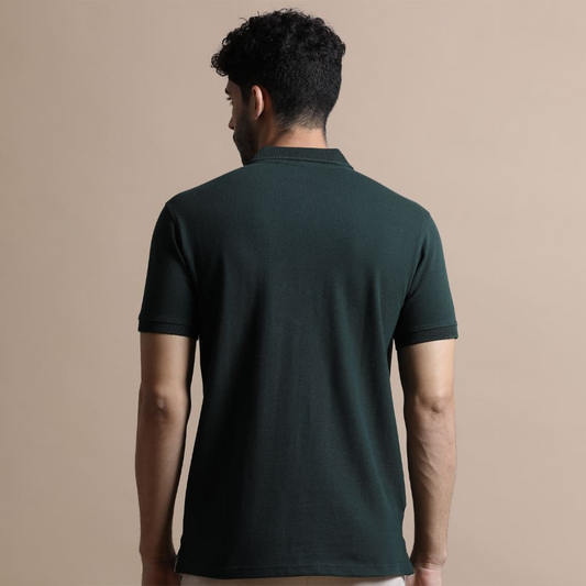 Back view of the personalized forest green jacquard polo t-shirt showing clean structure and textured fabric finish.