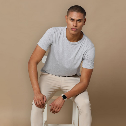 Grey crew neck t-shirt with a placeholder design area showing where users can add their own logo, artwork, or text for customization.