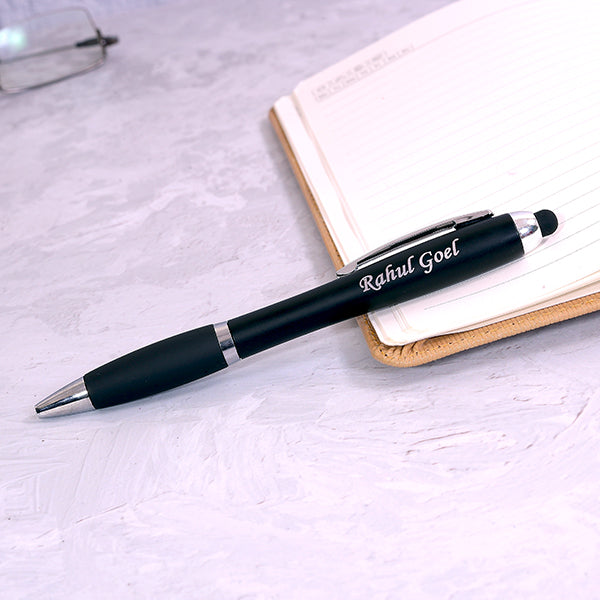 Personalized LED Keychain & Pen Set featuring a stylish black pen with custom engraving on a notebook