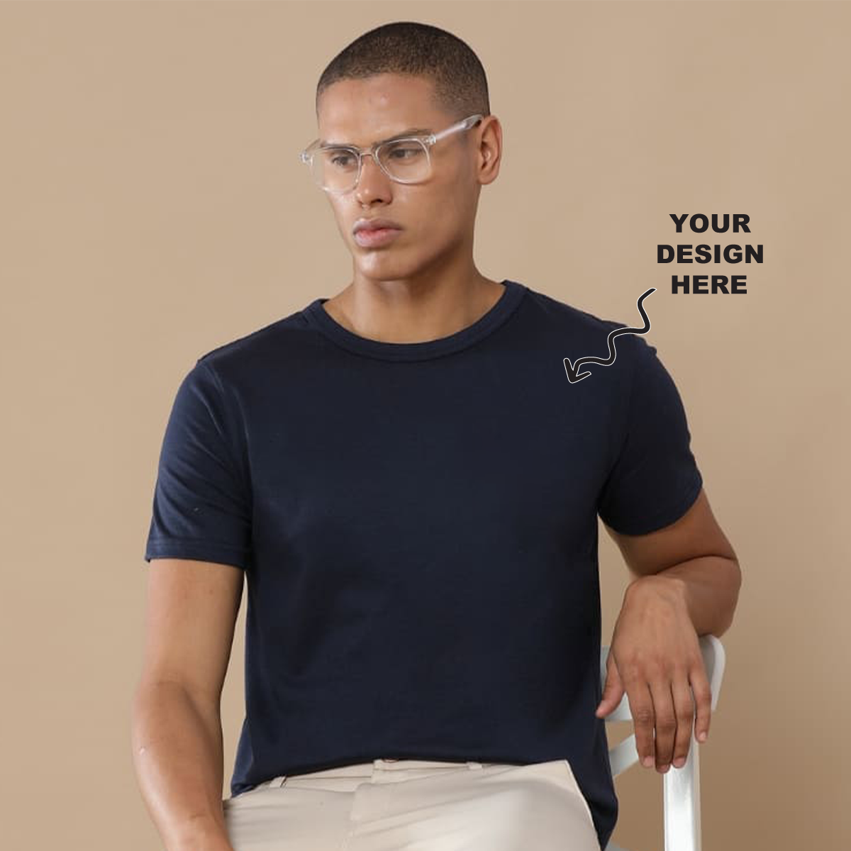 Navy blue round neck t-shirt with a placeholder logo area showing where users can add their own logo, artwork, or text for personalization.