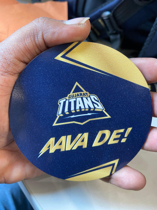 Personalized round coasters bulk featuring Gujarat Titans logo and vibrant colors for events