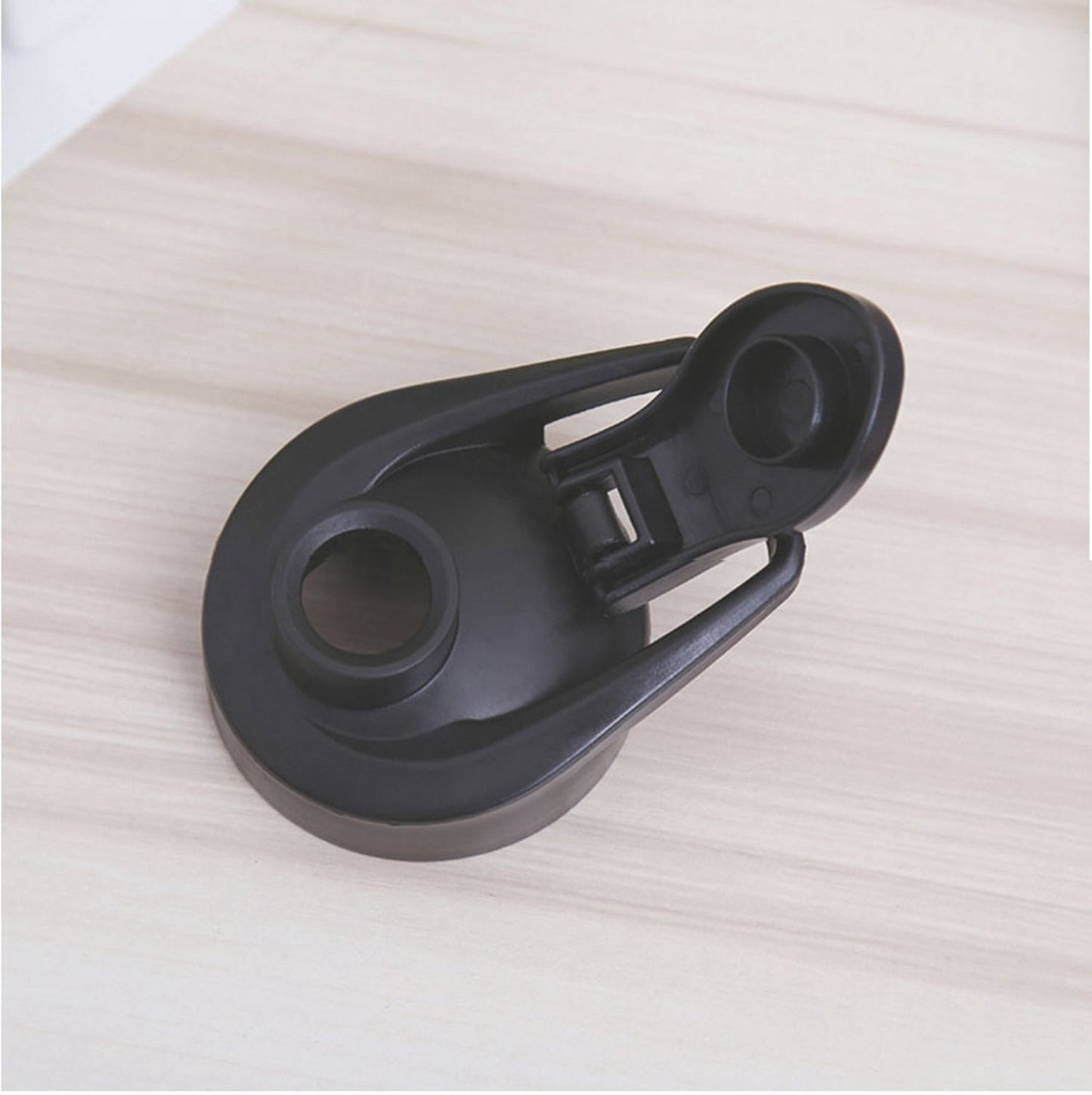 Black lid of a personalized sports sipper bottle with a secure spout design for easy sipping