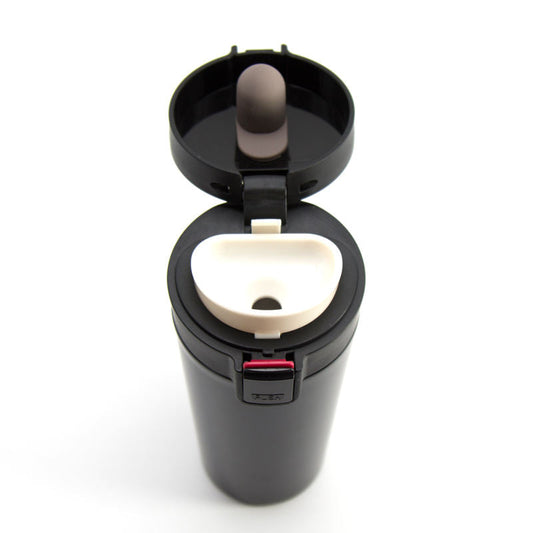 Top view of a personalized travel coffee cup with a lid and easy pour spout for on-the-go convenience