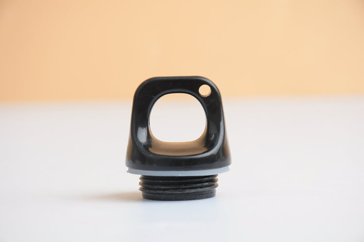 Close-up of a black lid for a personalized water bottle gift with a secure opening