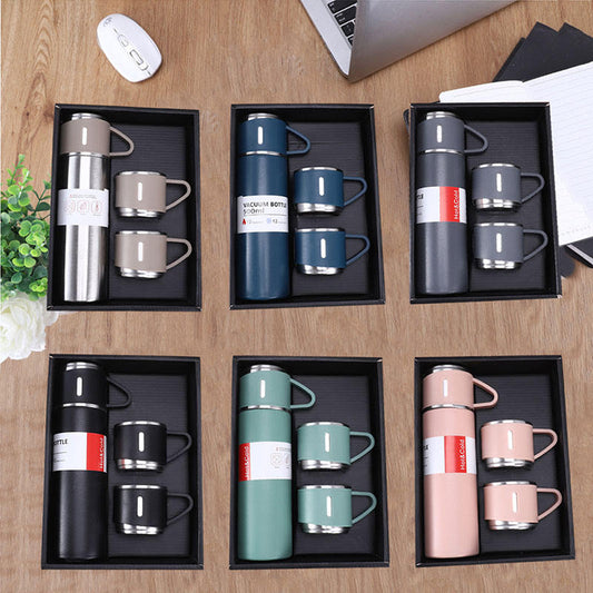 Steel Vacuum Flask Set including mugs in various colors for hot and cold beverages