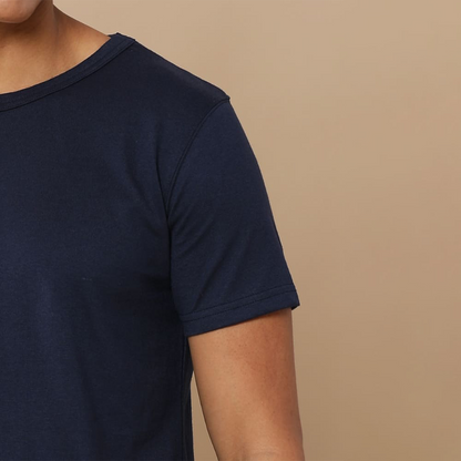 Close-up view of the collar and cuffs on the navy blue round neck t-shirt, highlighting the textured fabric and fine craftsmanship for a premium look.