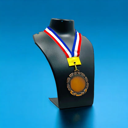 Personalized Medal displayed on a black stand with red, white, and blue ribbon for custom awards