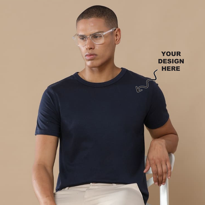 Navy blue round neck t-shirt with a placeholder logo area showing where users can add their own logo, artwork, or text for personalization.