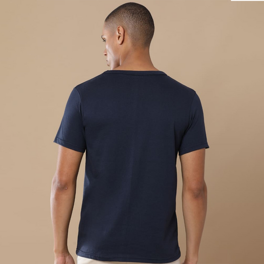Back view of the personalized navy blue round neck t-shirt showing clean structure and textured fabric finish.