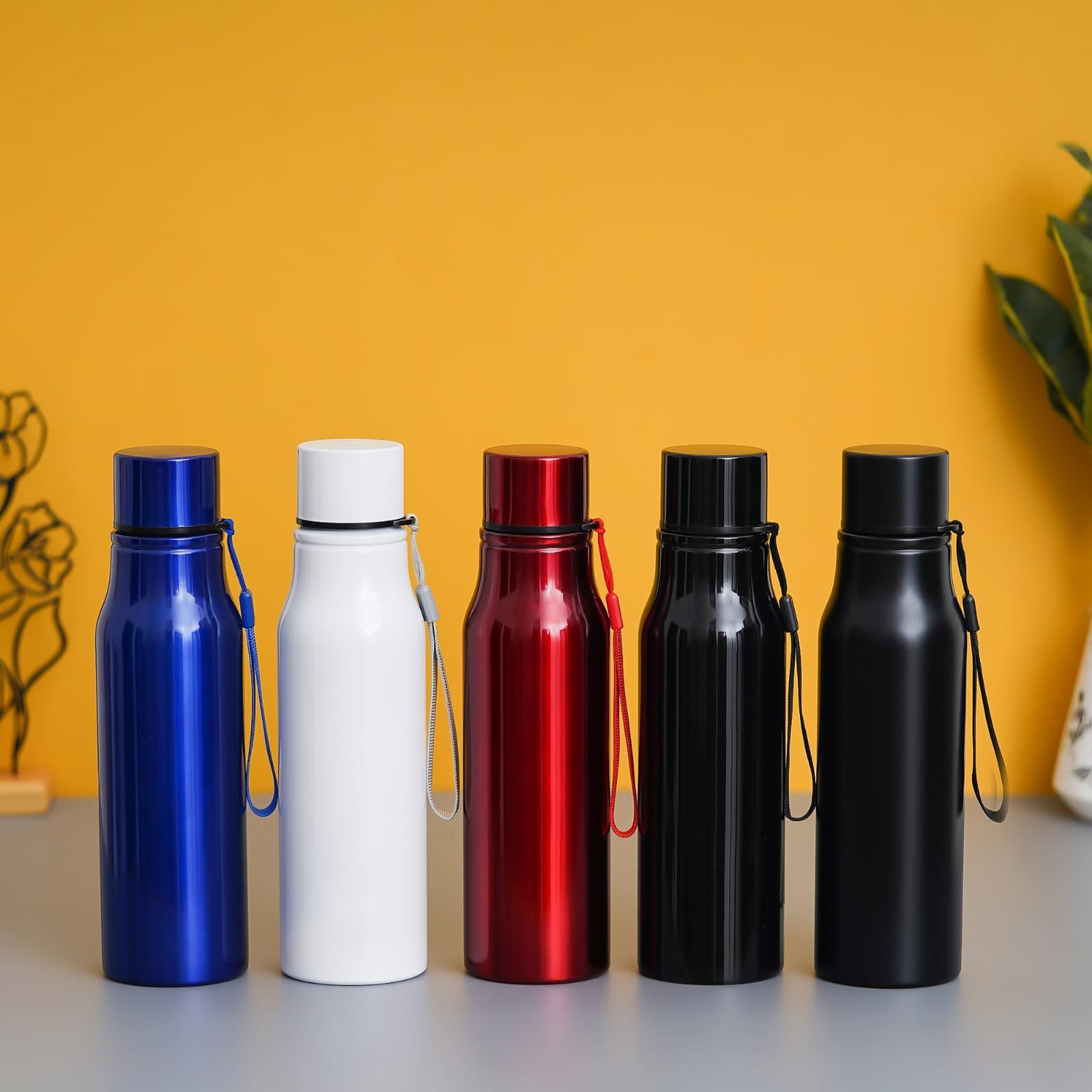 Collection of personalized stainless steel white water bottle and colorful options for stylish hydration