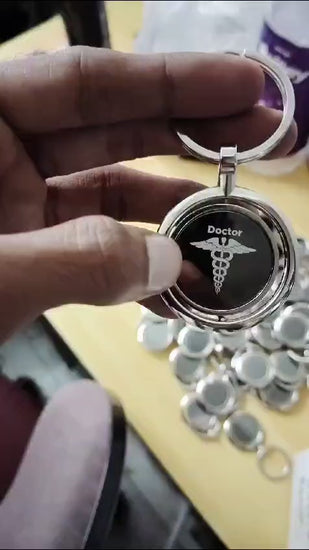 Cilanorm Pharma Company Doctor Return Gift Rotating Personalized Engraved Keychain.mp4